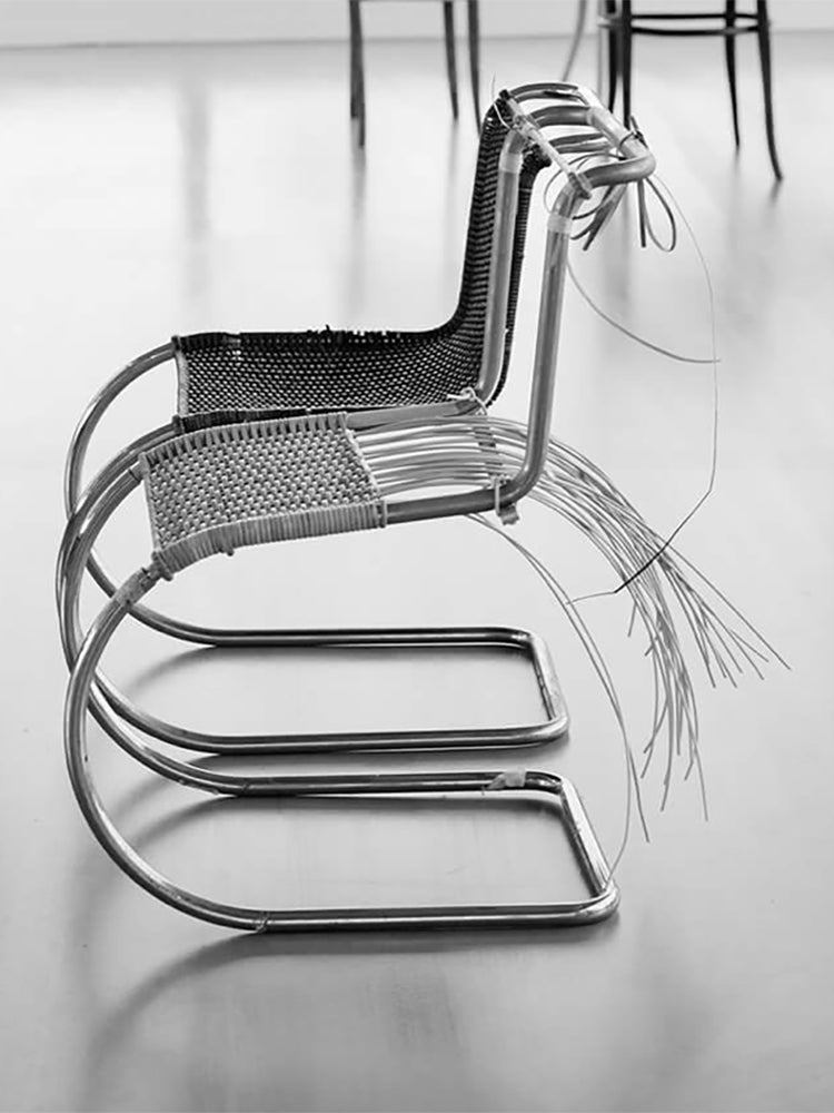 D42 Cantilever Chair With Armrests designed by  Mies Van der Rohe